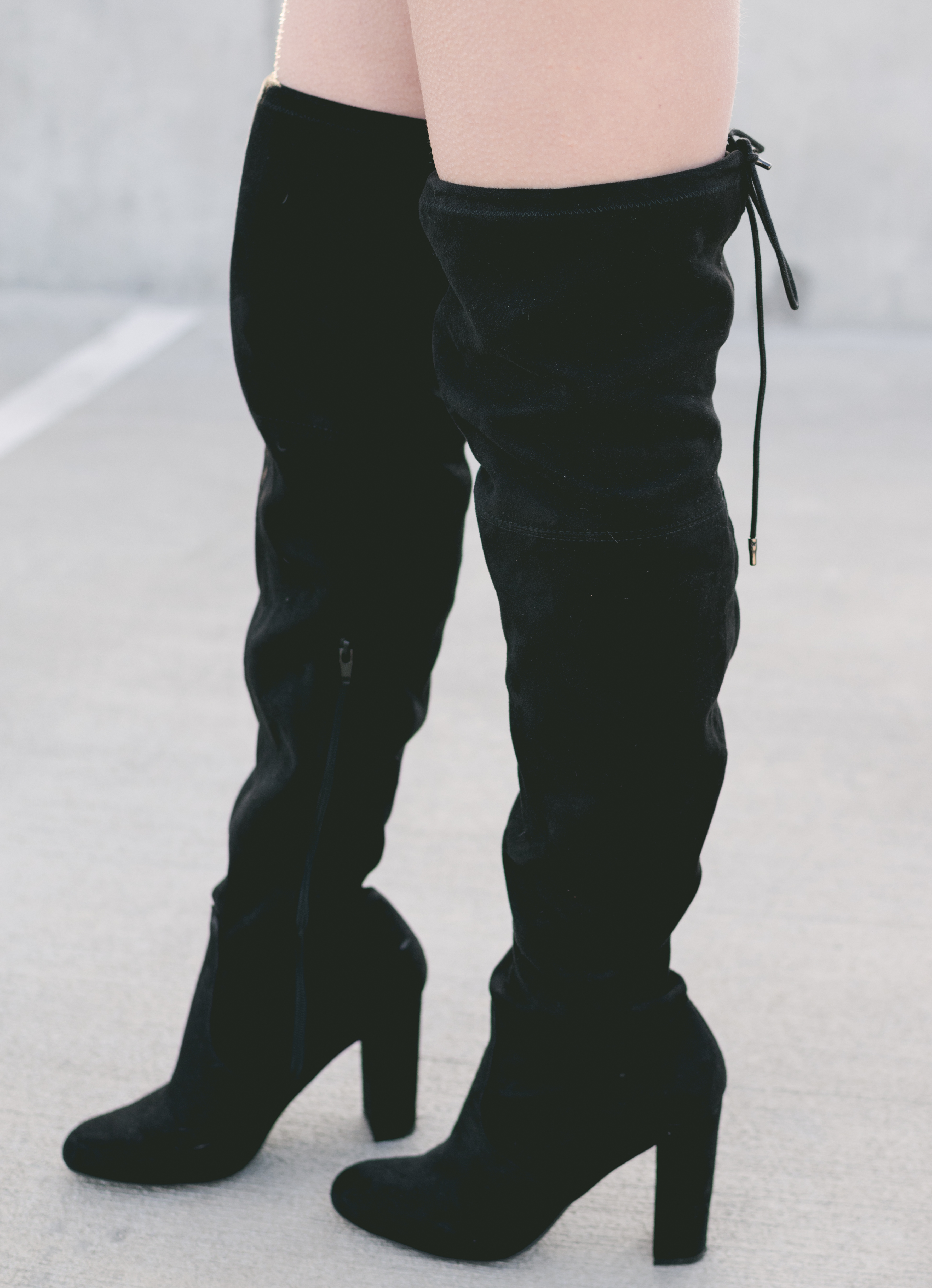 Black knee high boots perfect for new years