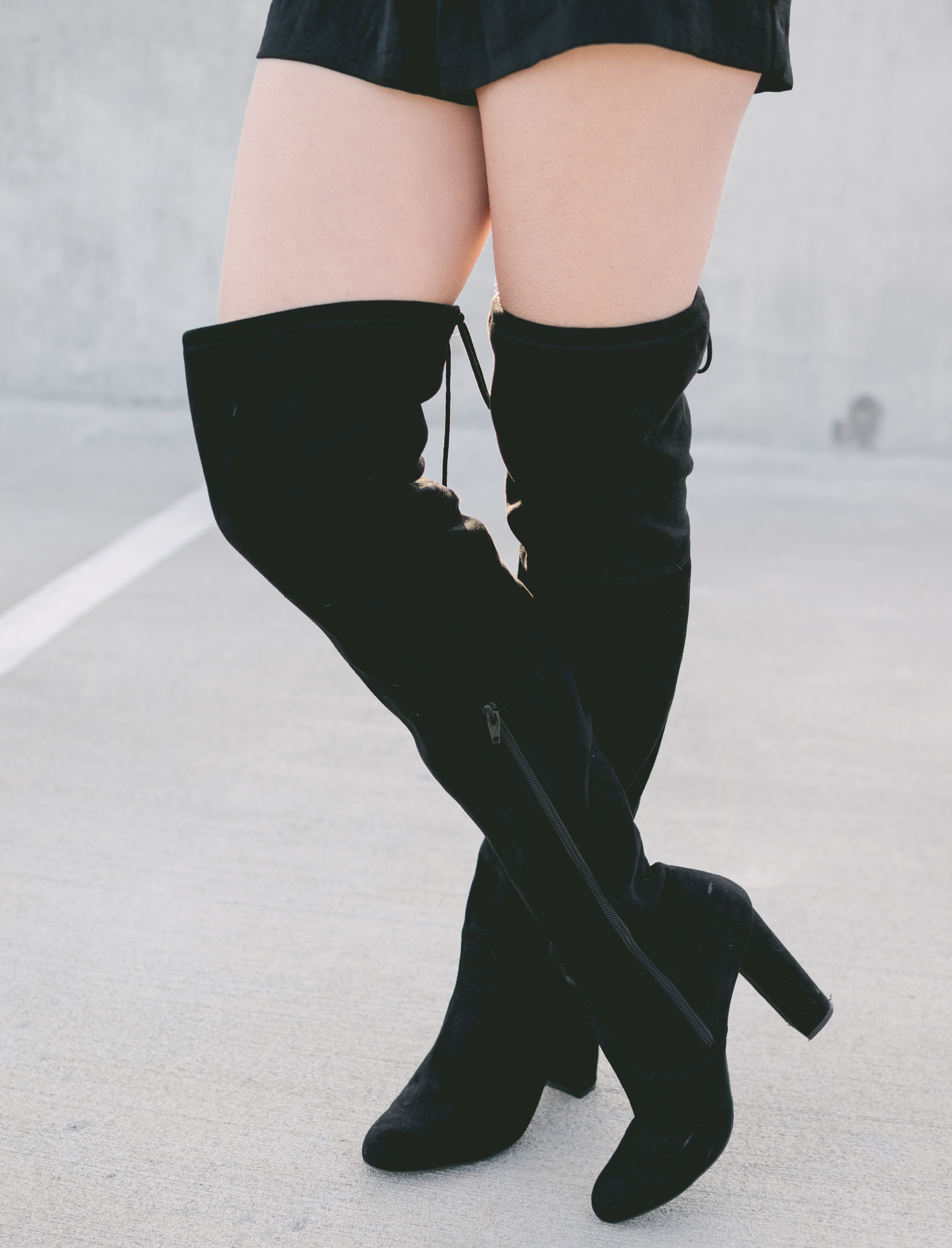 Black knee high boots perfect for new years